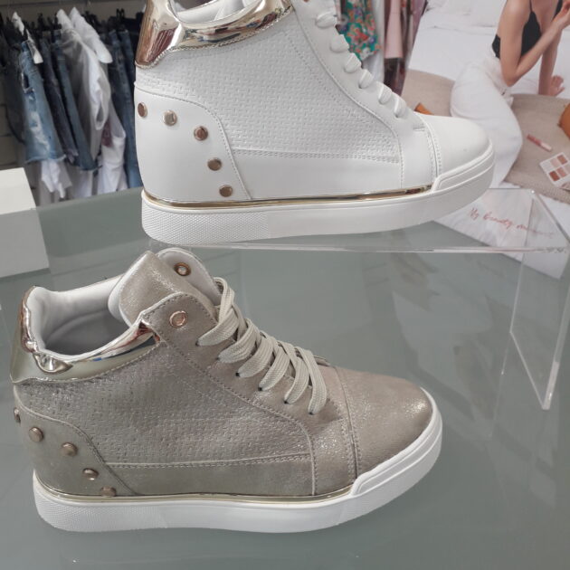 Calzature donna con rialzo interno